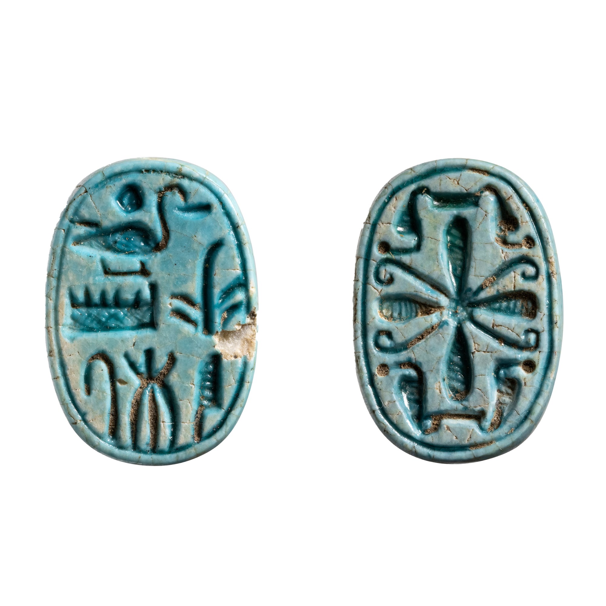 A Second IP to New-Kingdom blue faience scaraboid seal. 